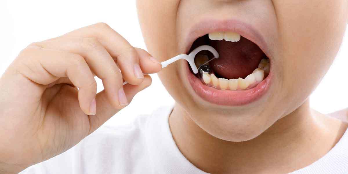 Kids Teeth Flossing